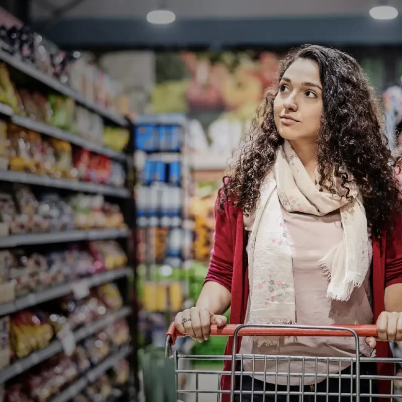 Lady Shopping, browsing supermarket isle